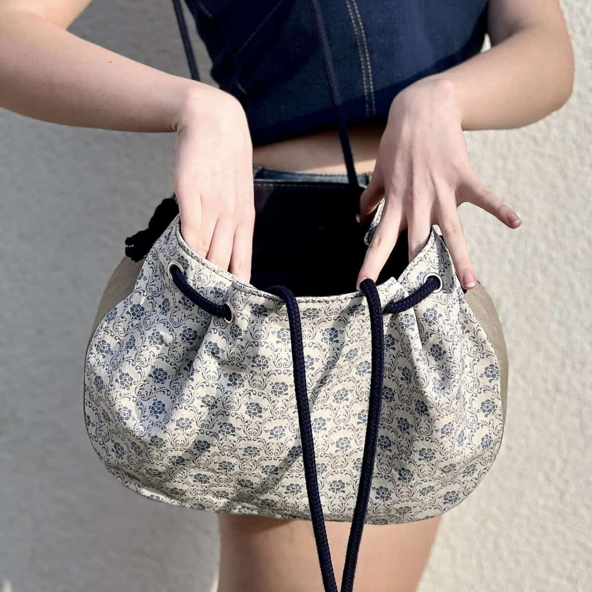 High-quality fabric bag with a floral pattern and drawstring—a stylish accessory for everyday use.