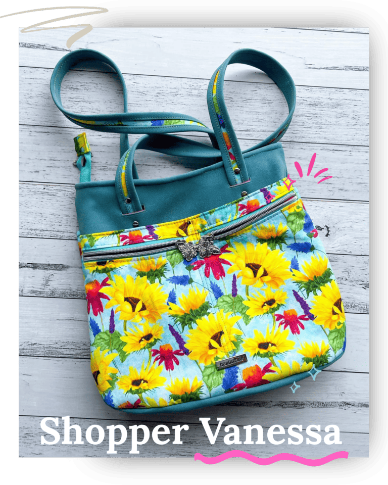 Colorful tote bag with a sunflower design and floral pattern.